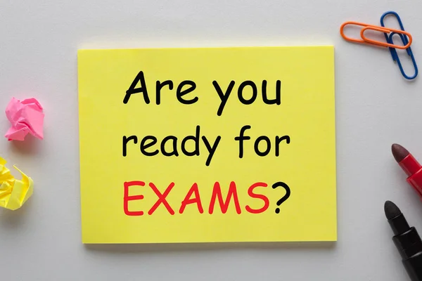 Are You Ready For Exam written on note with marker pen and various stationery. Business concept