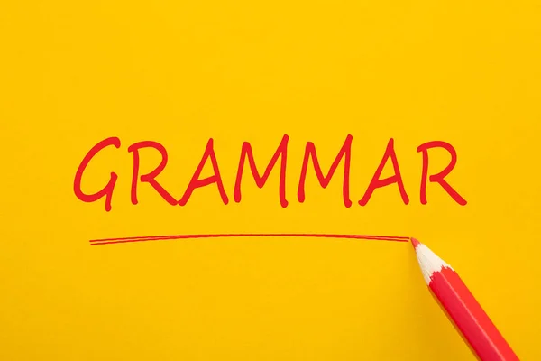 Grammatikwort Geschrieben Mit Rotem Bleistift Auf Gelbem Hintergrund Geschäftskonzept — Stockfoto