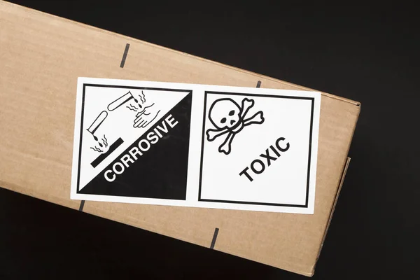 Warning Toxic and Corrosive