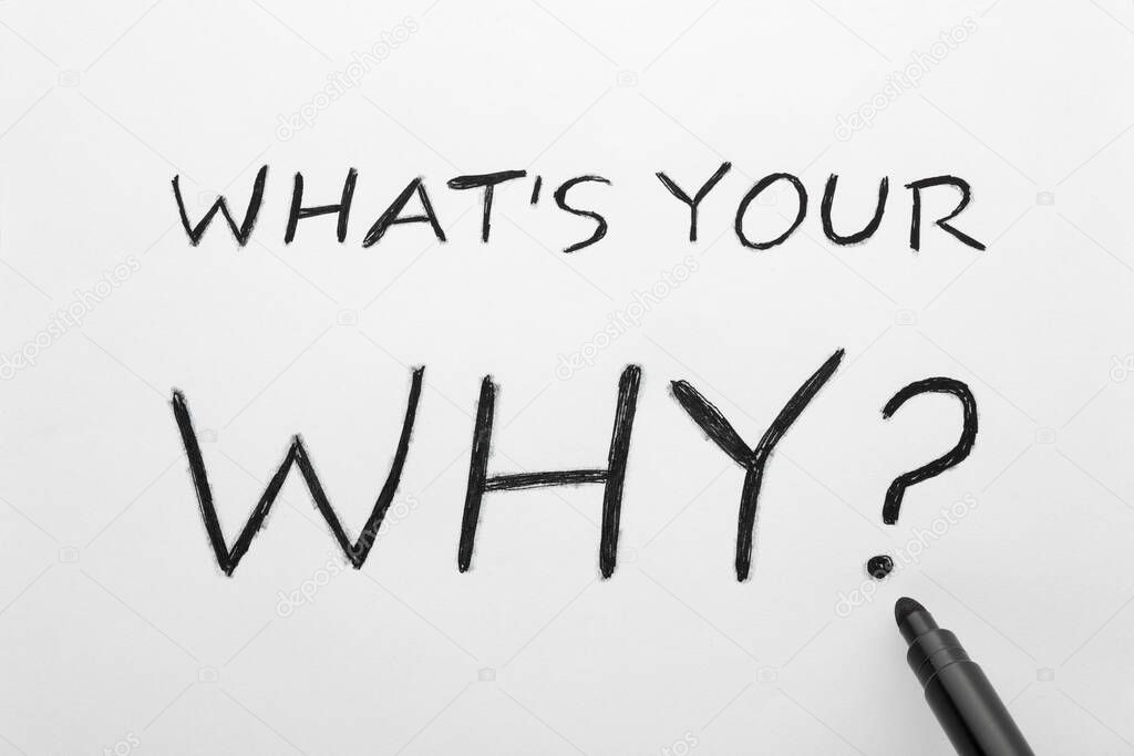 What's Your Why text on white paper sheet and black marker
