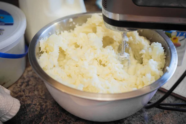 Mixing mashed potatoes for dinner