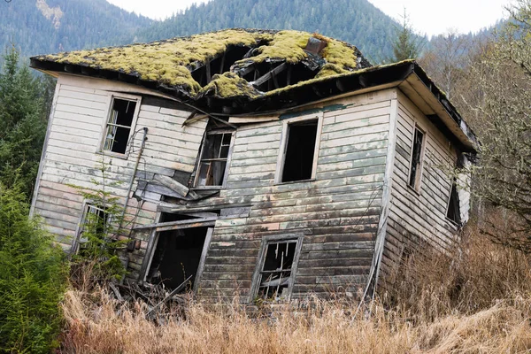 Collapsing wooden plank house, haunted house