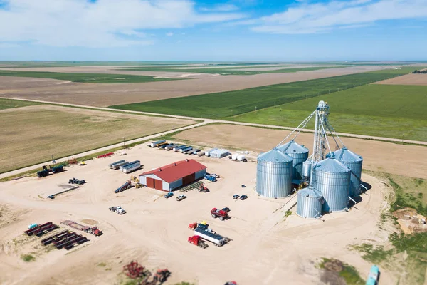 Aerial view of grain silos and farmland