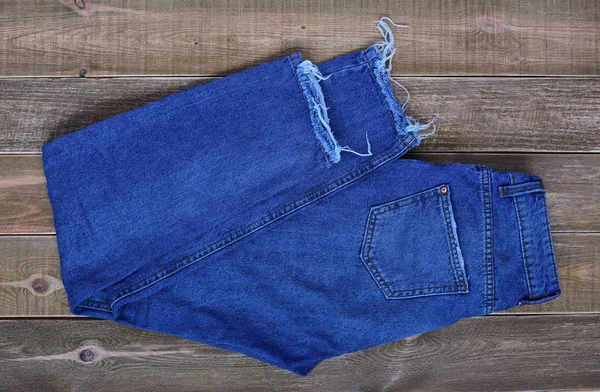 Vista Superior Las Mujeres Cintura Alta Pantalones Vaqueros Plegados Azules — Foto de Stock