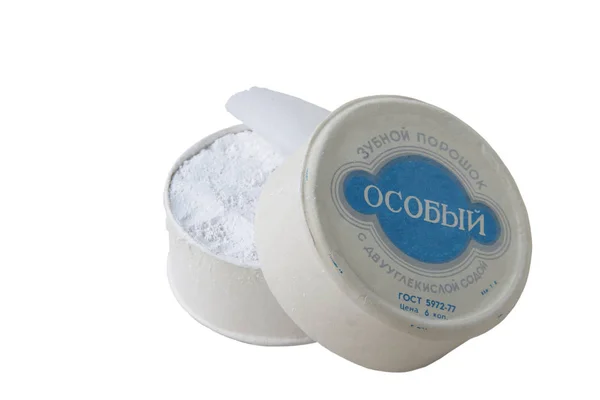 Tooth powder in an open round box with a white inscription on the lid. Special on a blue background.Tooth Powder Special with bicarbonate of soda. GOST 5972-77. The price is 6 kopecks. Kbsh T.P.