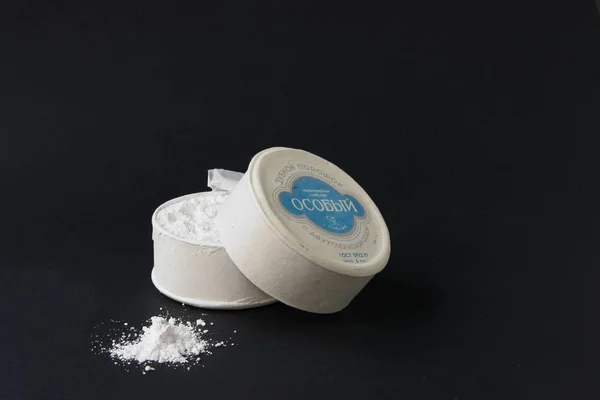 Tooth powder in an open round box with a white inscription special on a blue background and a white toothbrush on a black background. Tooth Powder Special with bicarbonate of soda. GOST 5972-77. The price is 6 kopecks. Kbsh T.P.