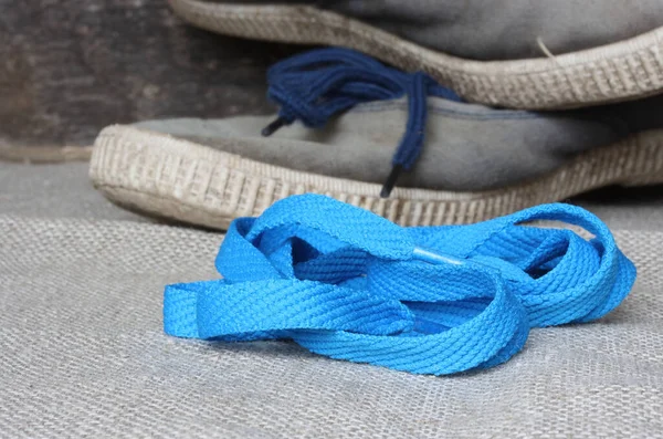 Zapatilla Azul Encaje Sobre Lienzo Zapatillas Fondo — Foto de Stock