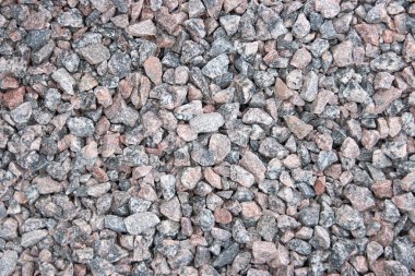 Çeşitli boyutlarda kırmızı granit molozların arka planı