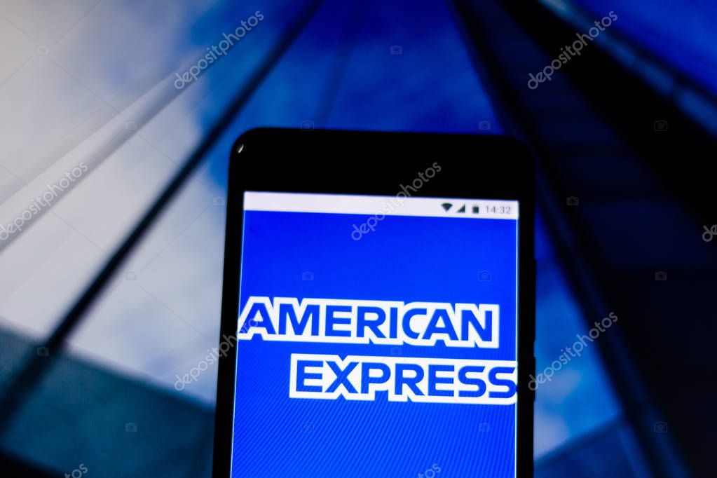 BRAZIL - MARCH 11, 2019: Logo of United States financial services company American Express on screen of mobile device