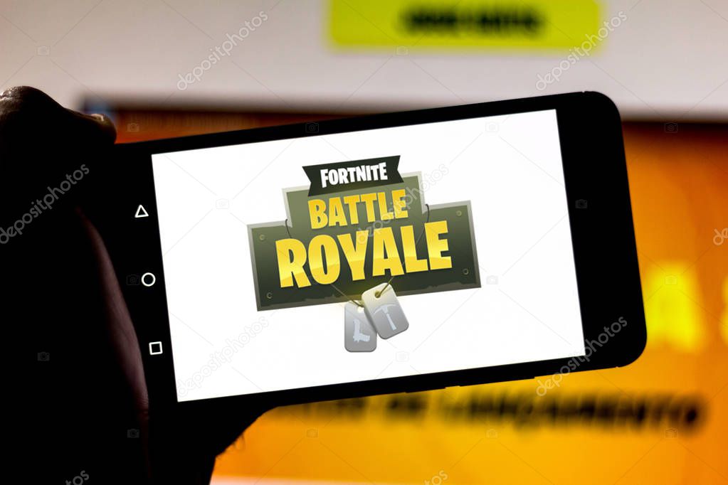 April 1, 2019, Brazil. Logo Fortnite Battle Royale on the screen of the mobile device. Fortnite is an online multiplayer online game developed by Epic Games.