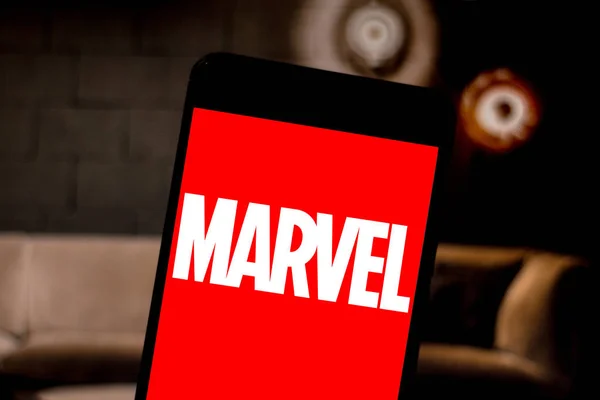 stock image April 3, 2019, Brazil. Marvel logo on the screen of the mobile device. Marvel Comics is a publisher of American comics and media. It is considered one of the largest publishers of comics in the world