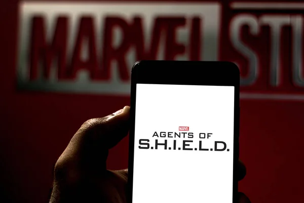 stock image April 7, 2019, Brazil. Logo of the Marvel Agents of S.H.I.E.L.D. on the mobile device. Agents of S.H.I.E.L.D. is an American television series originally broadcast on ABC network.