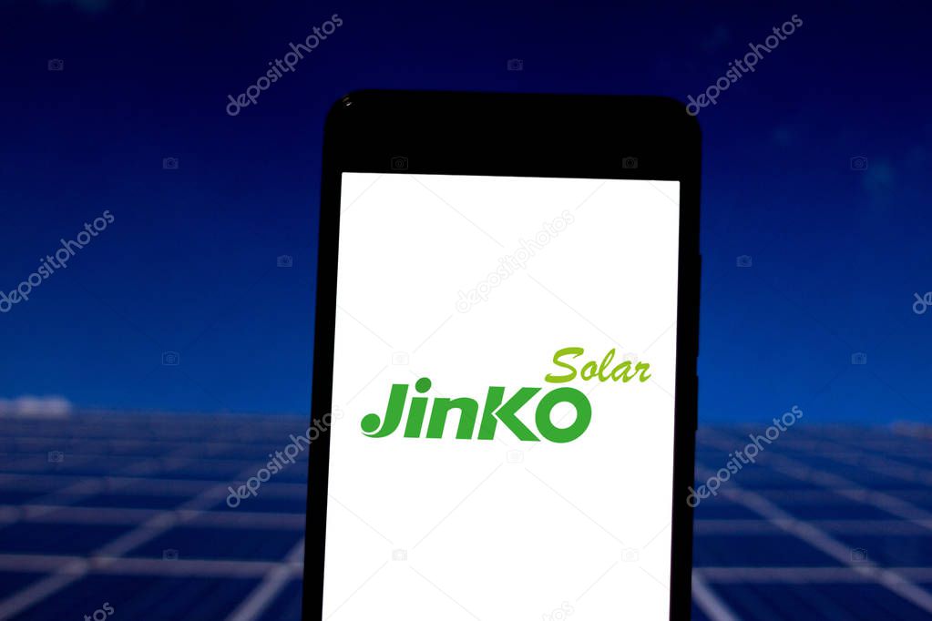 April 15, 2019, Brazil. Jinko Solar logo on the mobile device. Jinko is currently the largest manufacturer of solar panels in the world. Its headquarters are in Shanghai, China.