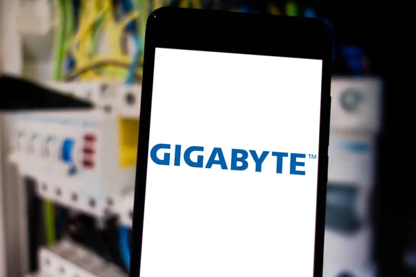 April 25, 2019, Brazil. Gigabyte logo on your mobile device. Gigabyte is a Taiwanese company founded in 1986, specializing in the manufacture of hardware — Stock Photo, Image