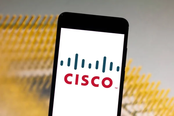 April 25, 2019, Brazil. Cisco logo on your mobile device. Cisco is a US transnational company that provides networking and communications solutions — Stock Photo, Image