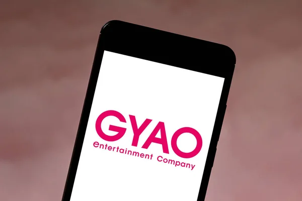 21 de mayo de 2019, Brasil. En esta ilustración de la foto el logotipo de GyaO Entertainment se muestra en un teléfono inteligente —  Fotos de Stock