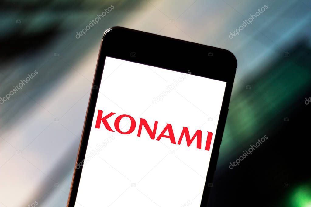 May 23, 2019, Brazil. In this photo illustration the Konami Holdings Corporation logo is displayed on a smartphone.