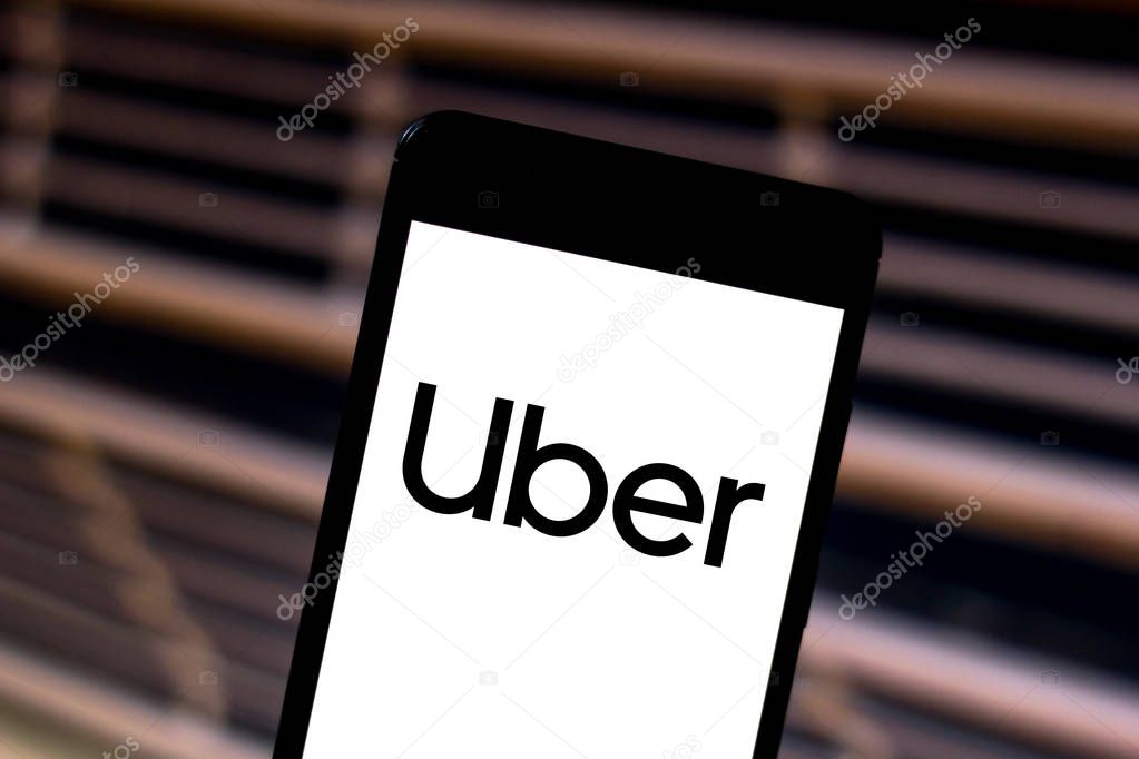 May 24, 2019, Brazil. In this photo illustration the Uber logo is displayed on a smartphone.