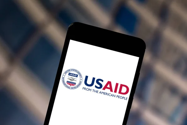 USAID logo on a smartphone
