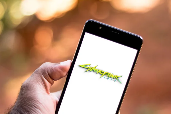 12 czerwca 2019, Brazylia. Na tej ilustracji zdjęcie logo Cyberpunk 2077 jest wyświetlane na smartfonie — Zdjęcie stockowe
