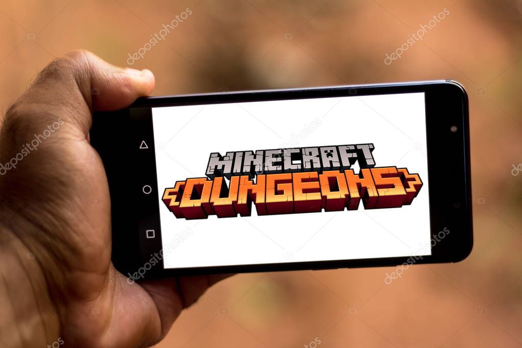 June 12, 2019, Brazil. In this photo illustration the Minecraft Dungeons logo is displayed on a smartphone.