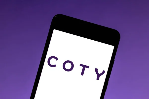 June 28, 2019, Brazil. In this photo illustration the Coty logo is displayed on a smartphone — Stock Photo, Image