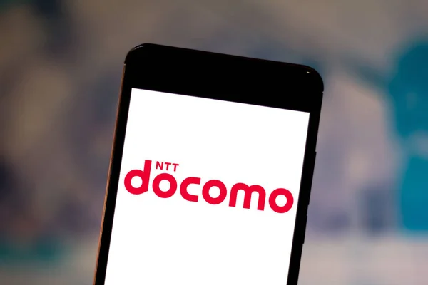 July 1, 2019, Brazil. In this photo illustration the NTT DoCoMo logo is displayed on a smartphone — Stock Photo, Image