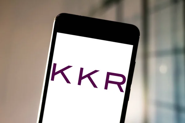 July 1, 2019, Brazil. In this photo illustration the KKR logo is displayed on a smartphone — Stock Photo, Image