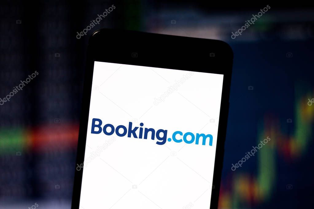 July 4, 2019, Brazil. In this photo illustration the Booking.com logo is displayed on a smartphone.