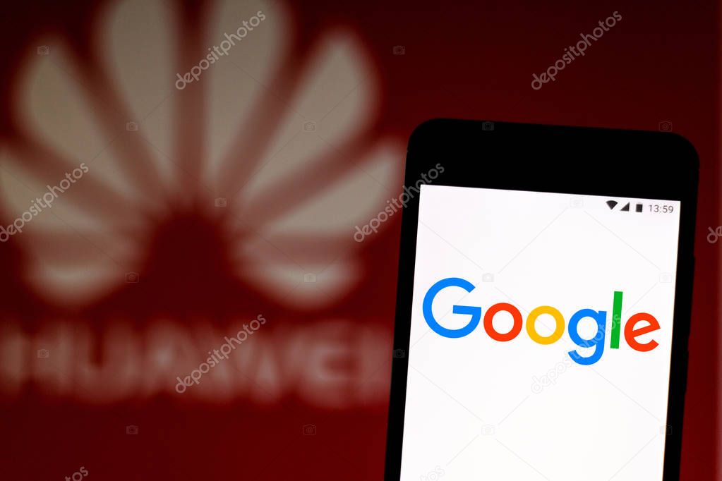 July 9, 2019, Brazil. In this photo illustration the Google logo is displayed on a smartphone. In the background, Huawei logo.