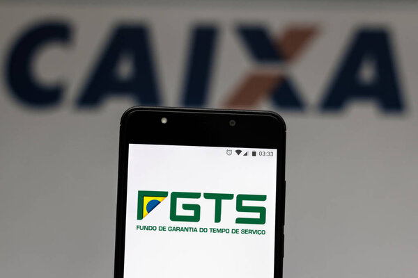 July 24, 2019, Brazil. In this photo illustration the Fundo de Garantia do Tempo de Serviço (FGTS) logo is displayed on a smartphone