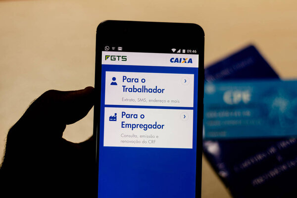 July 26, 2019, Brazil. In this photo illustration the app FGTS (Fundo de Garantia do Tempo de Serviço) is displayed on a smartphone