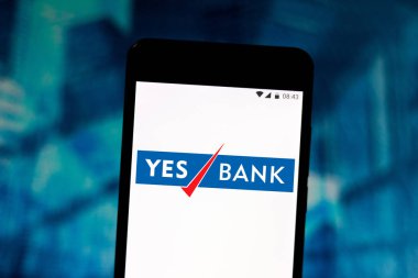 29 Temmuz 2019, Brezilya. Bu fotoğraf illüstrasyonunda Evet Bankası Limited logosu bir akıllı telefonda görüntülenir