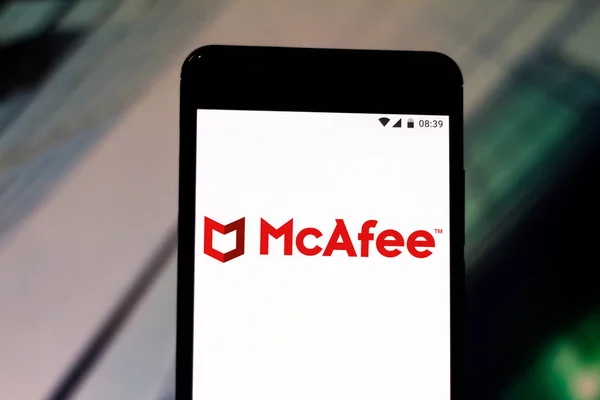 August 6, 2019, Brazil. In this photo illustration the McAfee logo is displayed on a smartphone — Stock Photo, Image