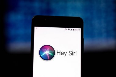 August 19, 2019, Brazil. In this photo illustration the Siri logo is displayed on a smartphone clipart