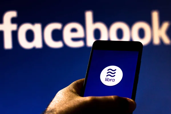 August 20, 2019, Brazil. In this photo illustration the Facebook Libra logo is displayed on a smartphone — Stock Photo, Image