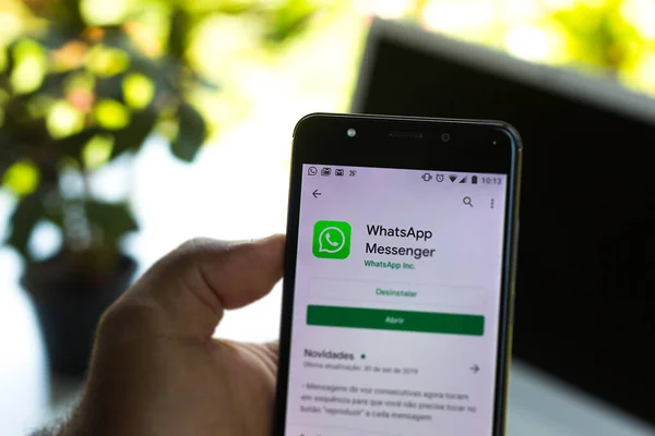 October 03, 2019, Brazil. In this photo illustration the WhatsApp Messenger logo is displayed on a smartphone — Stock Photo, Image