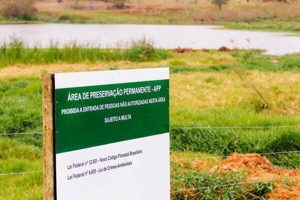 October 4, 2019, Brazil. Permanent Preservation Area Sign - APP - Site protected by law for the preservation of water resources and biodiversity - Concept and Ecology - Pantanal - Amazonia