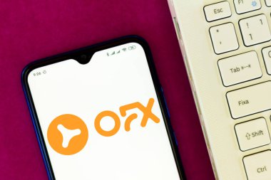 26 Temmuz 2020, Brezilya. Bu resimde OFX Limited logosu akıllı telefondan gösteriliyor.