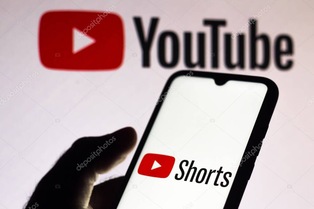 September 21, 2020, Brazil. In this photo illustration a YouTube Shorts logo is seen displayed on a smartphone with an YouTube logo on the background