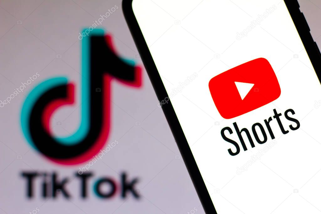 September 21, 2020, Brazil. In this photo illustration a YouTube Shorts logo is seen displayed on a smartphone with an TikTok logo on the background