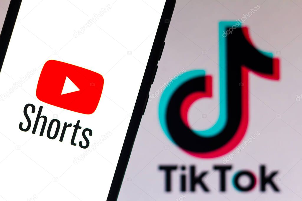 September 21, 2020, Brazil. In this photo illustration a YouTube Shorts logo is seen displayed on a smartphone with an TikTok logo on the background