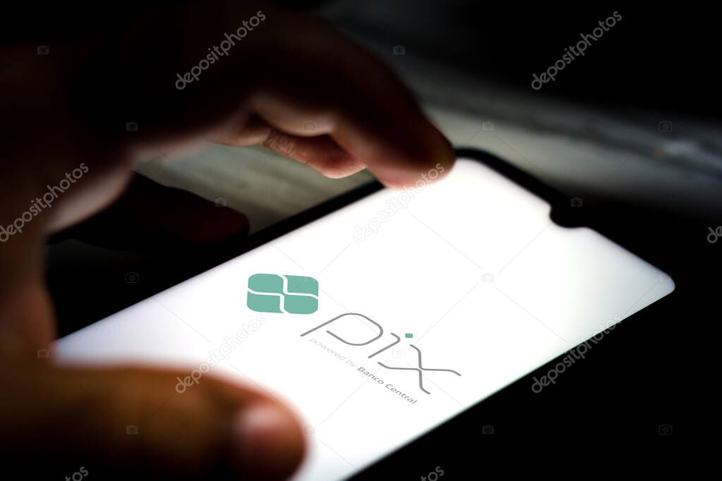 October 1, 2020, Brazil. In this photo illustration the Pix powered by Banco Central logo seen displayed on a smartphone. It is an electronic payment system in Brazil