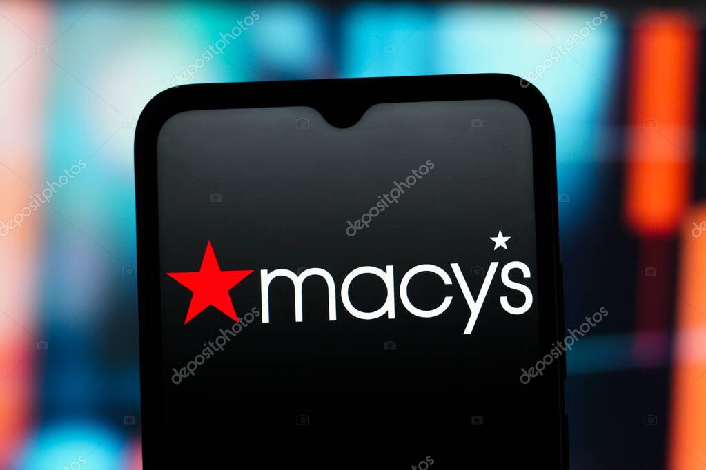 In this photo illustration, the Macy's logo is seen displayed on a smartphone screen