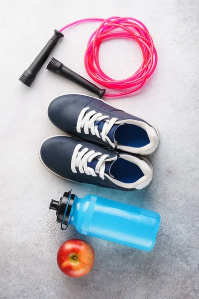 Fitness background with various sport equipment. Flat lay.