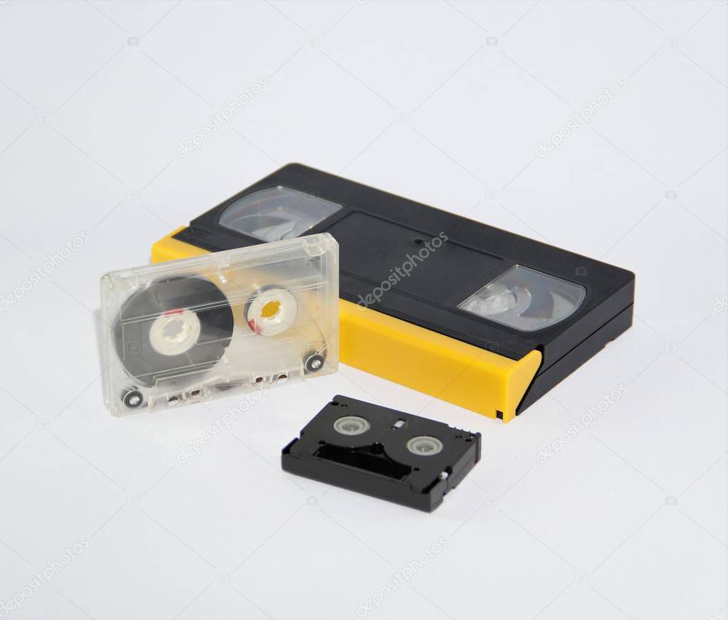 three cassettes on white background