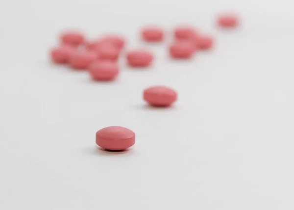 Różowe Tabletki Białym Tle — Zdjęcie stockowe