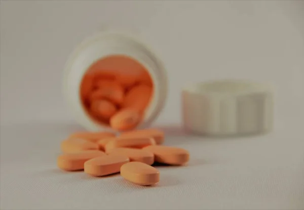 Orange Pills Container — Stock Photo, Image