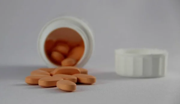 Orange Pills Container — Stock Photo, Image