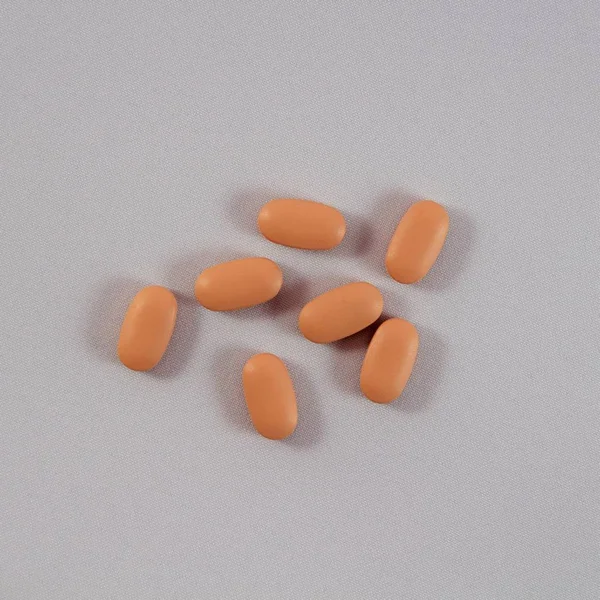 Oranje Tabletten Witte Achtergrond — Stockfoto